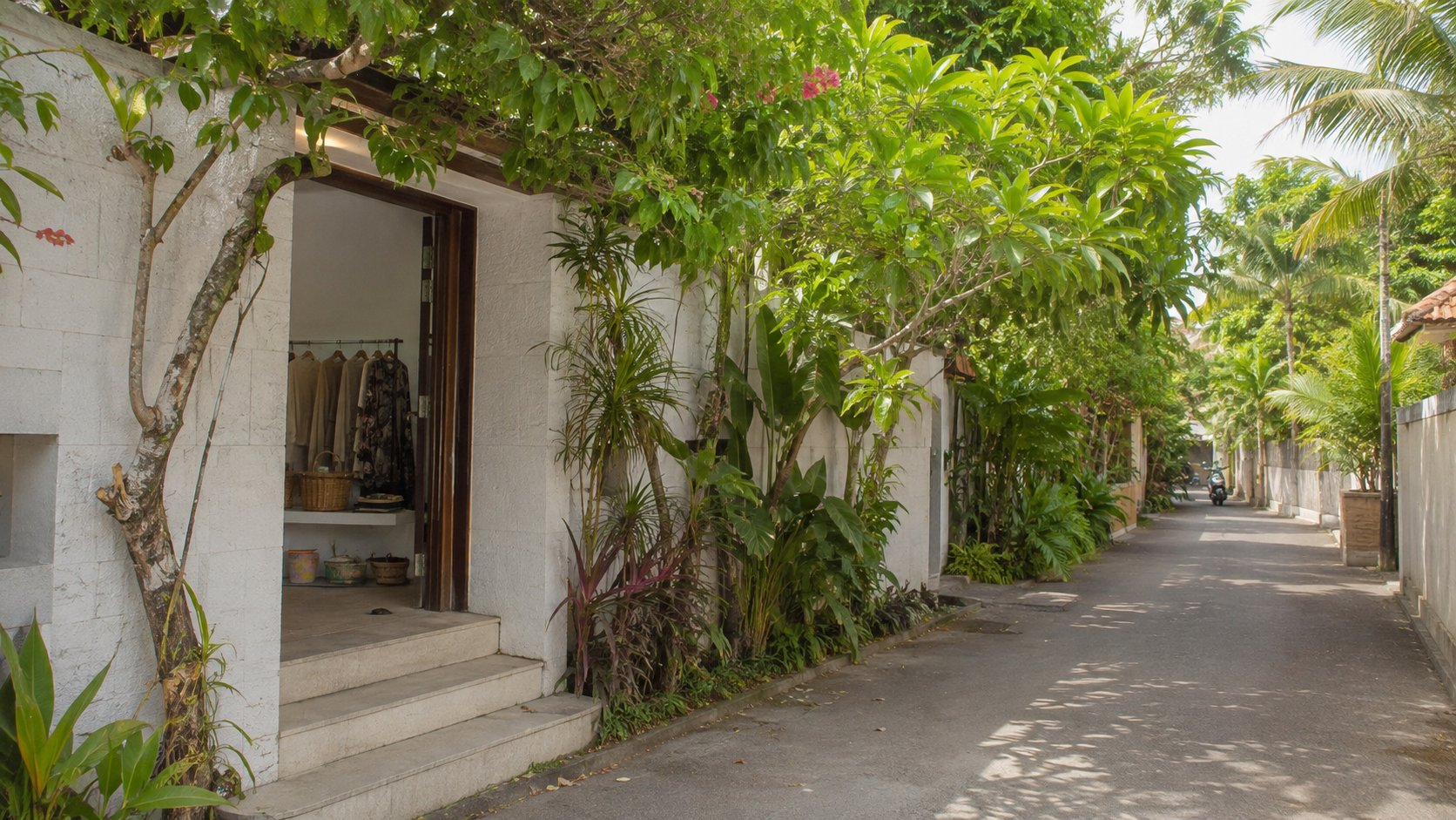 A leafy side lane in Seminyak with a small independent boutique hidden among tropical greenery